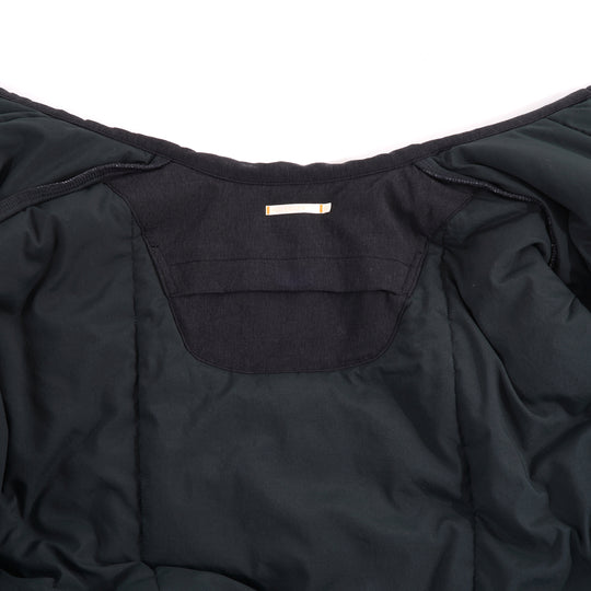 【寒さから身を守る、布団生まれのディフェンス力】ディフェンダー ロングコート / ブラック